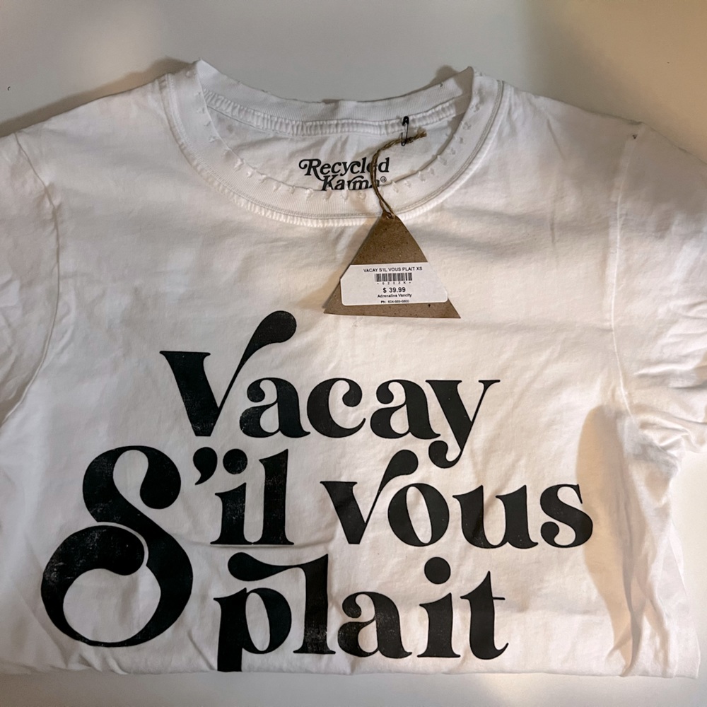 BNWT. Vacay s’il vous plait t-shirt! White with black writing. XS.